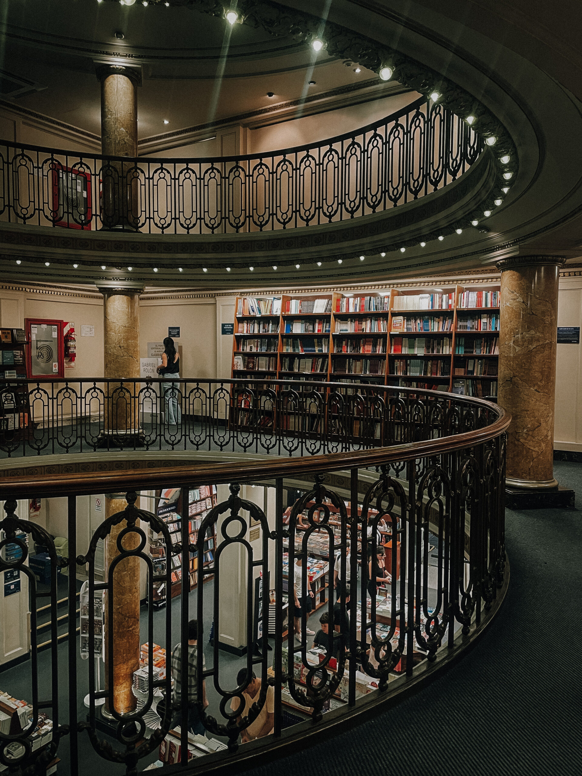 Rows of bookcases on second floor of Ateneo Grand Splendid bookstore in Buenos Aires, overlooking floor below