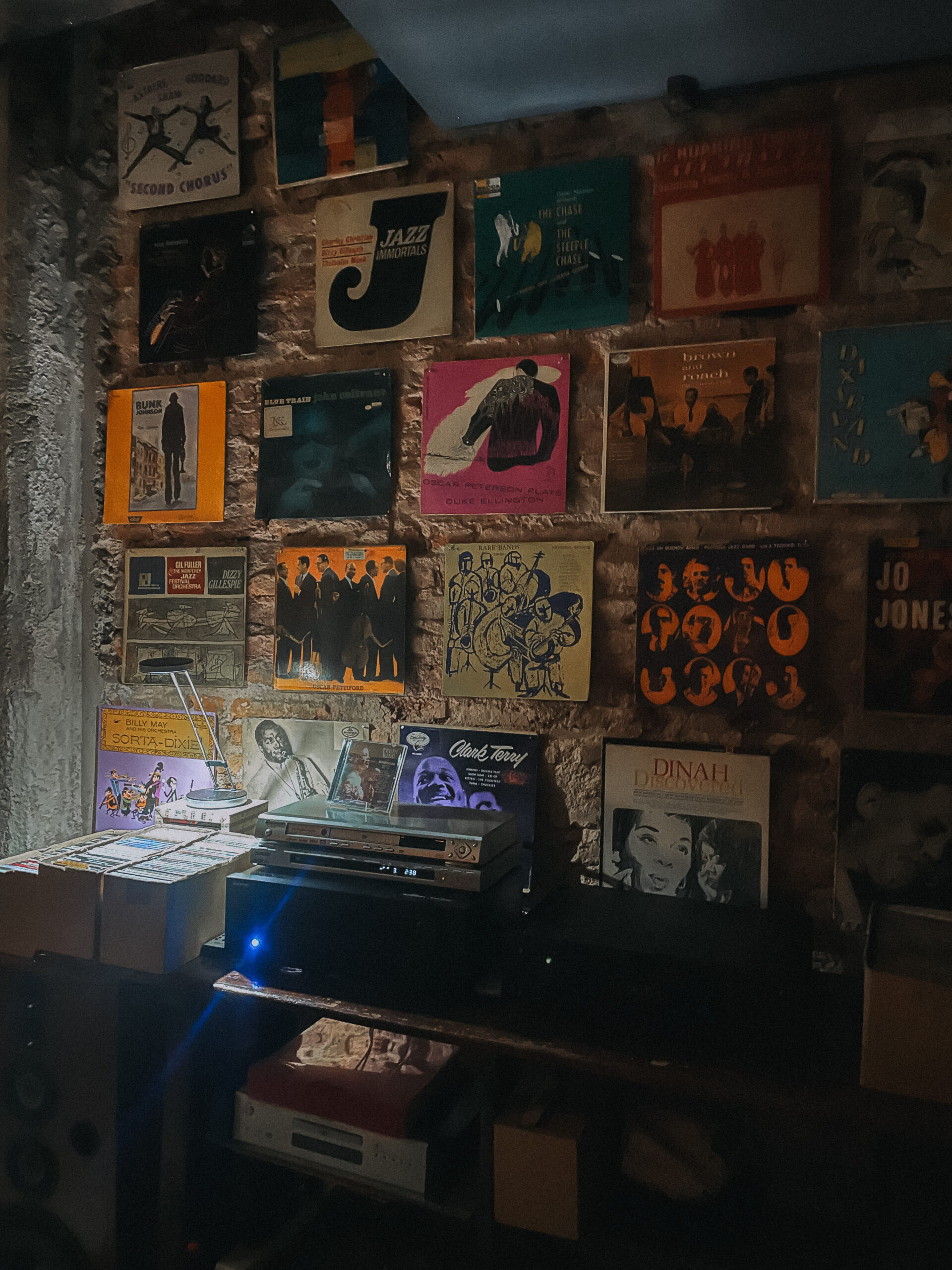 Room inside Prez Jazz bar in Buenos Aires showcasing wall with album covers